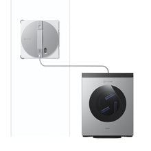 WINBOT W3 OMNI sur une vitre, relié à sa station